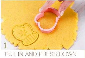 Christmas cookie cutters and stamp set featuring Santa and Xmas cookie embosser, perfect Christmas baking gift for kids, popular in the USA and Europe.